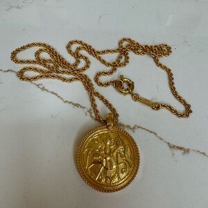 Long Julie Voss double sided coin necklace.
